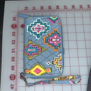 New Vera Bradley blue, cotton wallet. Aztec designs. Wrist strap. Holds phone.